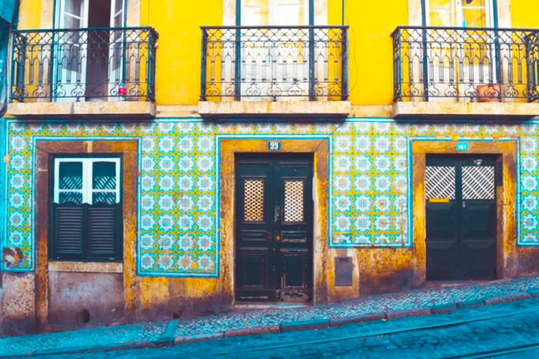 brightly tiled row of houses in Portugal