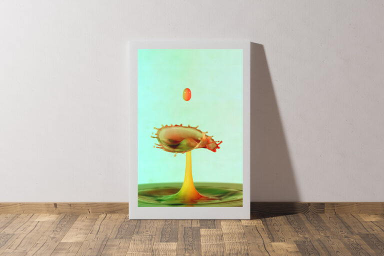 image of art canvas leaning against a wall with abstract water drop image on it.